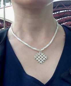 Grid Pendant Necklace - Silver and Mother Of Pearl - shown worn - handmade in sterling silver and pearlescent white mother-of-pearl semi-precious stones - with a s-hook clasp