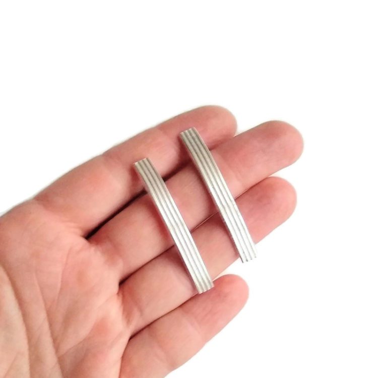 Silver Stripes Barre Earrings by Essemgé - on palm of hand for scale