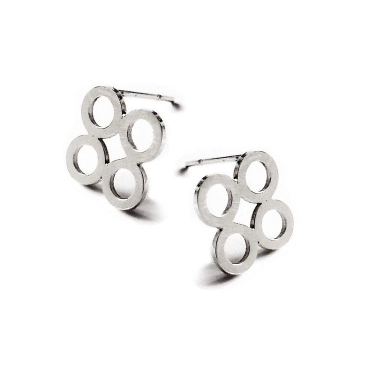 Quatrefoil silver stud earrings on white background