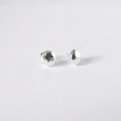 Round pebble silver stud earrings on white background