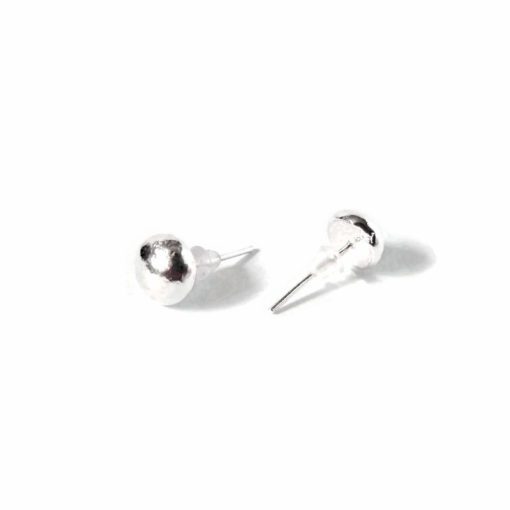 silver round pebble stud earrings on white background