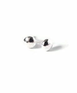silver round pebble stud earrings on white background