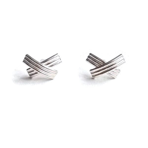 XX shiny silver stud earrings - on white background