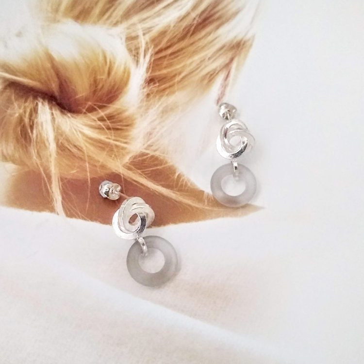 Graphic Rose Dangle Earrings - Silver and Frosted Rock Crystal - on model for scale
