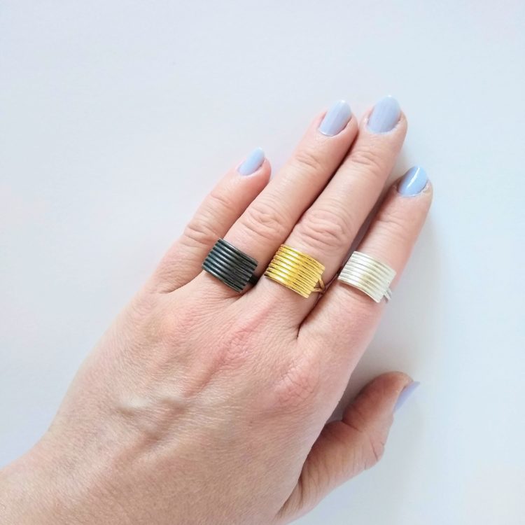 South London Independent Jeweller - Set of 3 rings on 3 fingers - black,gold,silver
