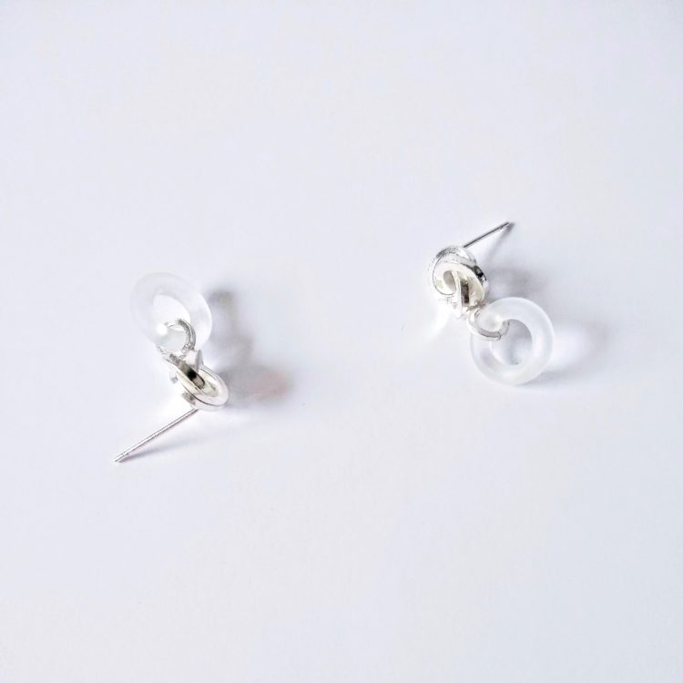 Graphic Rose Dangle Earrings - silver and frosted rock crystal - on white background