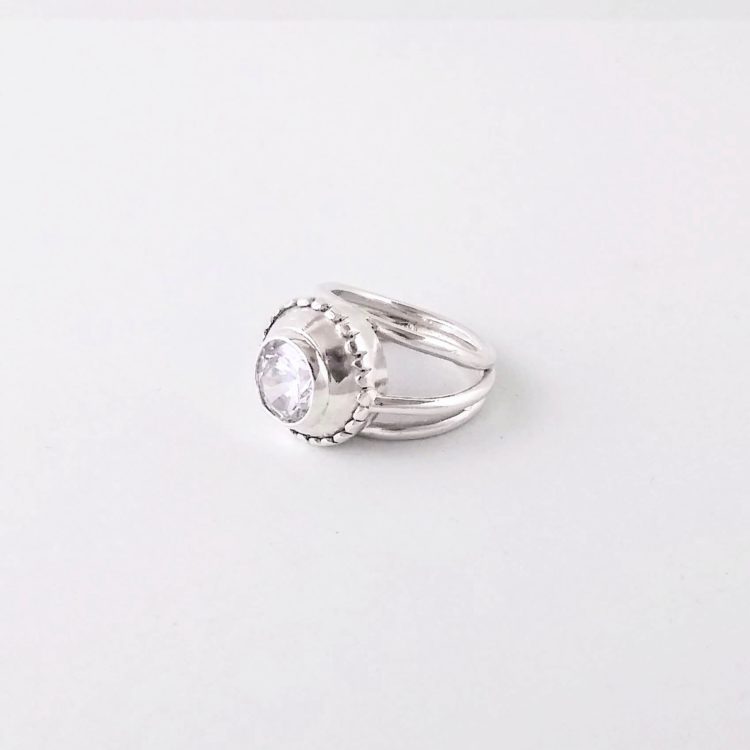 Silver ring with faceted rock crystal 