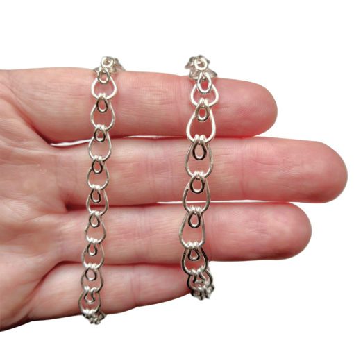 Silver-Leaves-Chain-Bracelet-&-Necklace - presented on palm of hand for scale