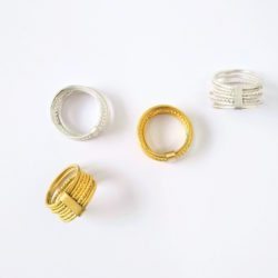 Gold and Silver Semainier Rings - on white background