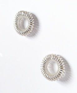 Round coil stud earrings - silver - on white background