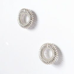 Round coil stud earrings - silver - on white background