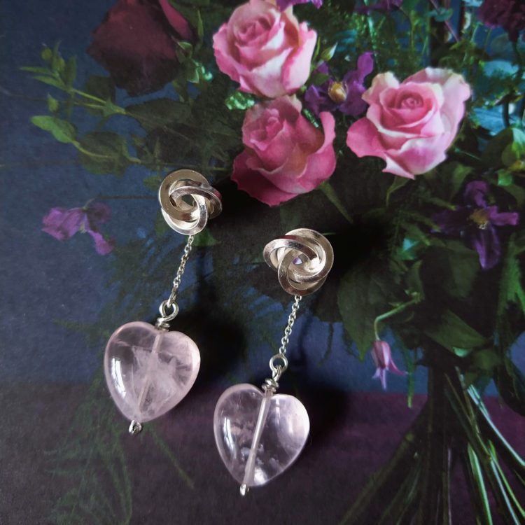 Silver Graphic Rose Stud Earrings - with short rose quartz heart dangle add-on - on floral background