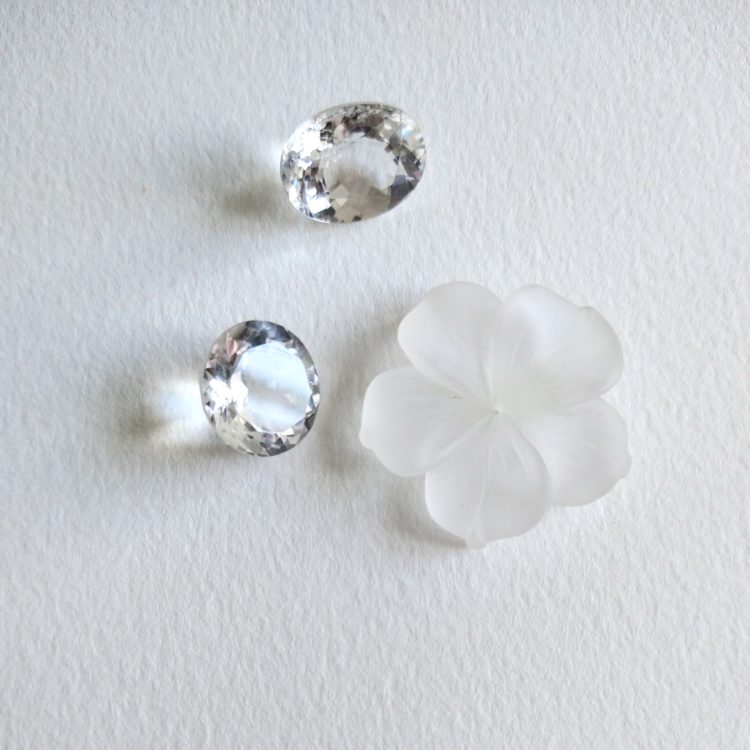 A Diamond is Forever - coloured alternatives to diamond - modern take on the Edwardian era with a scattering of white and transparent stones - on white background. 