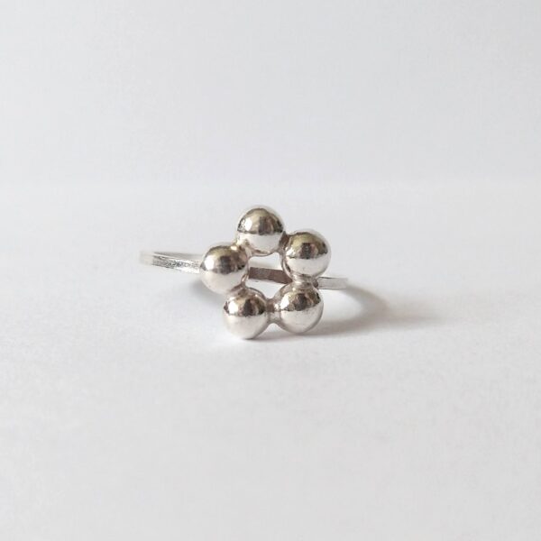 Caviar No5 'Blossom' Stacking Ring - silver ring on a white background