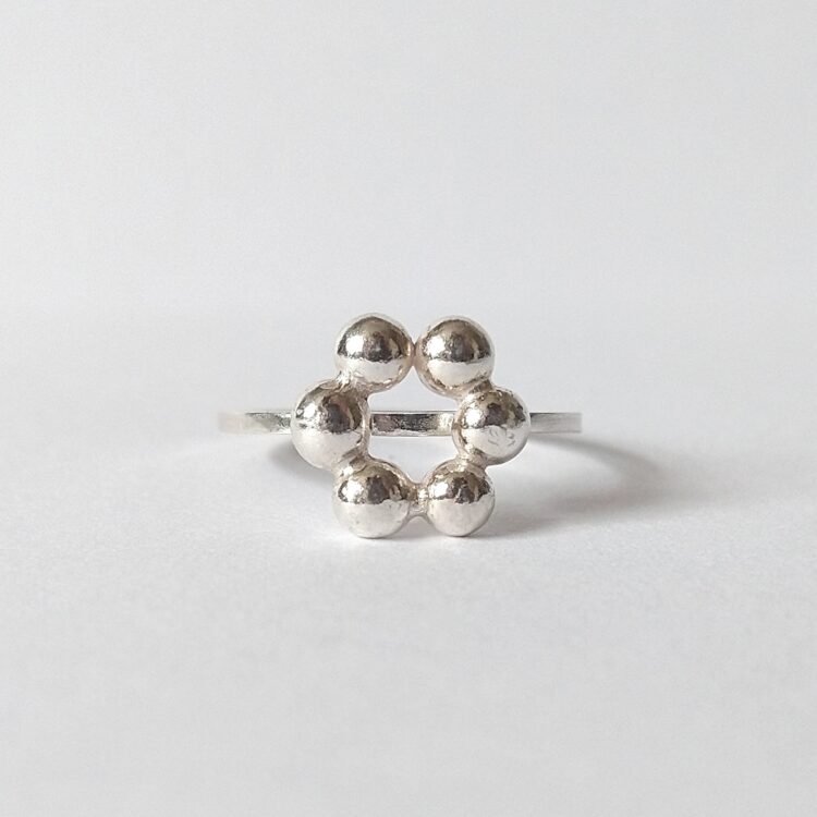 Caviar No6 'Bloom' stacking ring by Essemgé - silver ring on white background