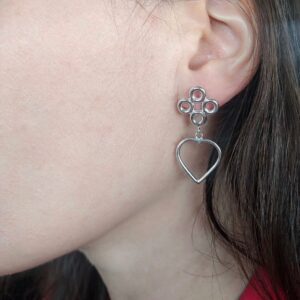 Quatrefoil Heart Dangle Earrings by Essemgé - silver earrings on model
