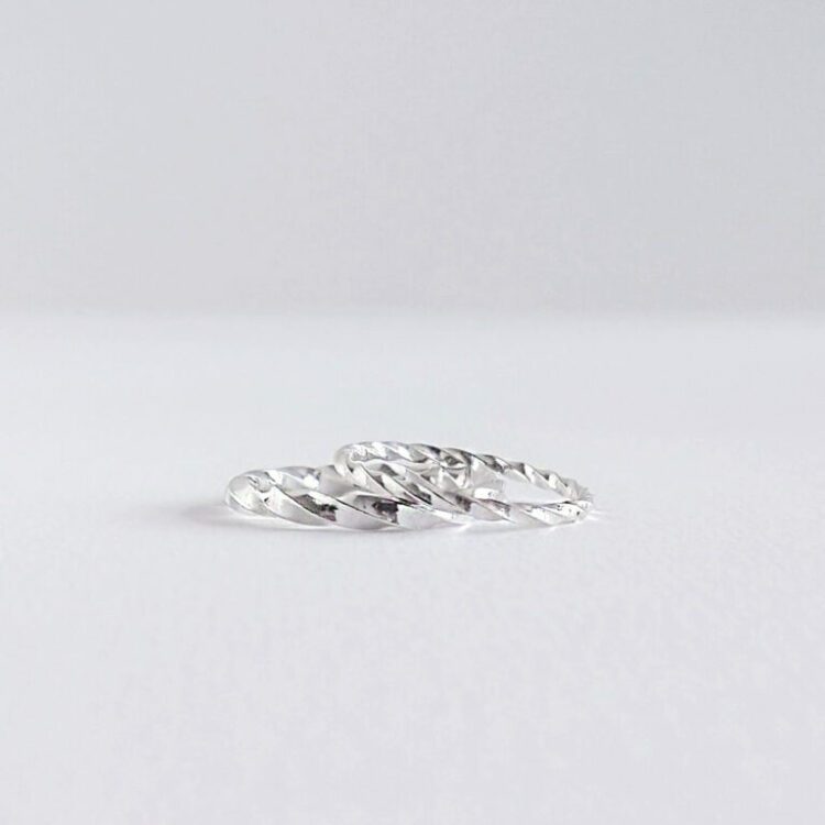 Twisted Square 2-piece stacking rings set by Essemgé - silver rings on white background