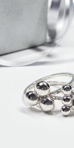 Night & Day Caviar Rings Set by Essemgé - 2 stacking silver rings on white background