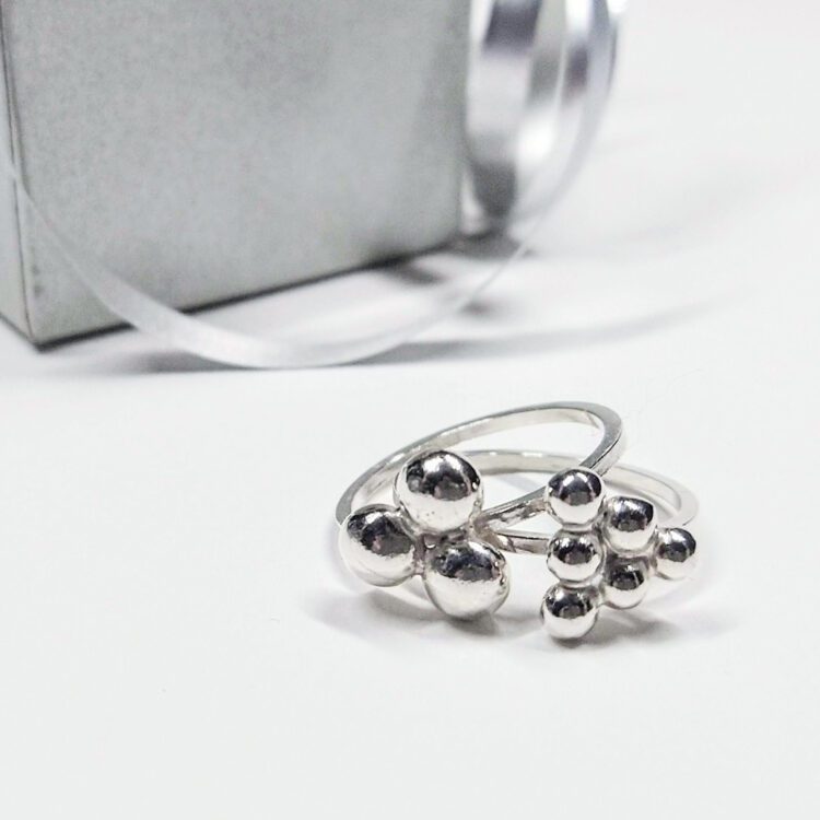 Night & Day Caviar Rings Set by Essemgé - 2 stacking silver rings on white background