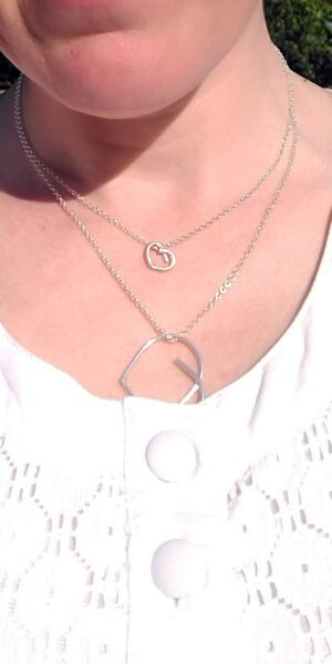 Silver Heart Pendant Necklaces by Essemgé - MINi & MAXI sizes layered - on model
