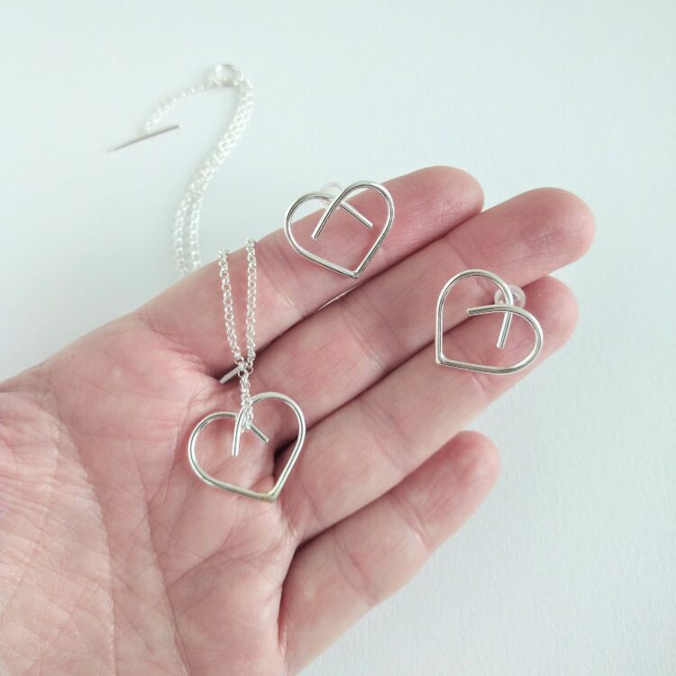 Midi Heart Necklace and Earrings set by Essemgé - silver pendant necklace and matching stud earrings on hand for scale